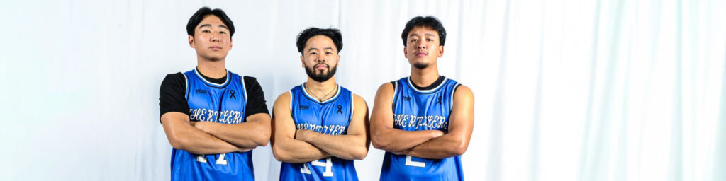 3 people with their arms crossed